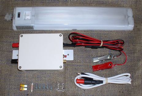 Fluorescent strip light system for medium to large hen houses.